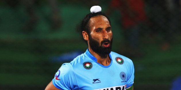 RAIPUR, INDIA - DECEMBER 06: Sardar Singh captain of India celebrates scoring during the penalty shoot out during the match between Netherlands and India on day ten of The Hero Hockey League World Final at the Sardar Vallabh Bhai Patel International Hockey Stadium on December 06, 2015 in Raipur, India. (Photo by Ian MacNicol/Getty images)