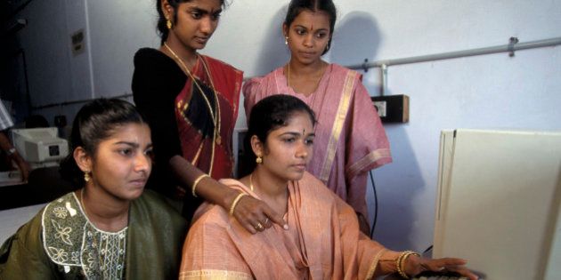 Women studying word processing, India