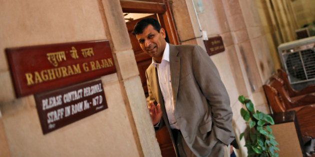 FILE PHOTO: India's chief economic adviser Raghuram Rajan stands outside his room at the finance ministry in New Delhi August 6, 2013. REUTERS/Adnan Abidi/File photo