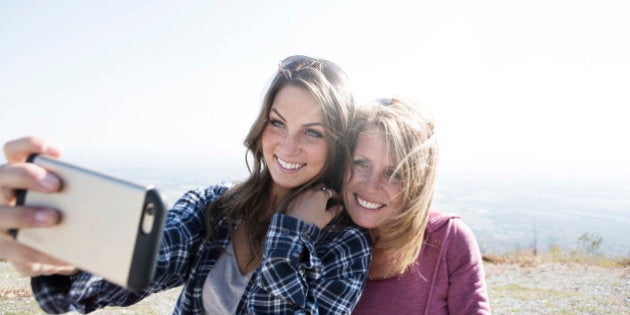 Mother and daughter taking a selfie