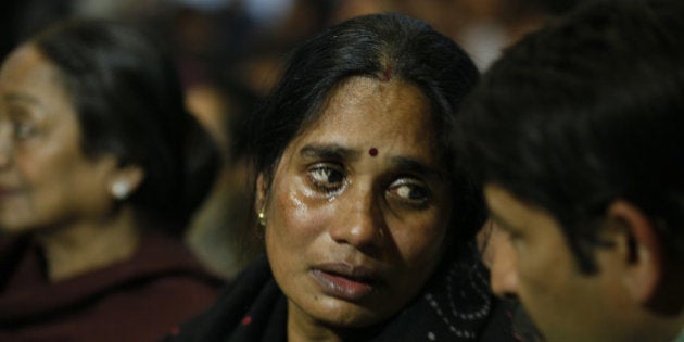 NEW DELHI, INDIA - DECEMBER 16: Mother of Nirbhaya gets emotional at a prayer meeting to remember Nirbhaya on the second anniversary of the fatal gang-rape organized by Nirbhaya Jyoti Trust at Rajendra Bhawan on December 16, 2014 in New Delhi, India. On December 16, 2012, a 23-year-old physiotherapy student was brutally gang raped and by six men, including a juvenile, in a moving bus. The incident unleashed a wave of public anger over levels of violence against women in the country. Nirbhaya Jyoti Trust which was established by Nirbhayas parents (Photo by Raj K Raj/Hindustan Times via Getty Images)