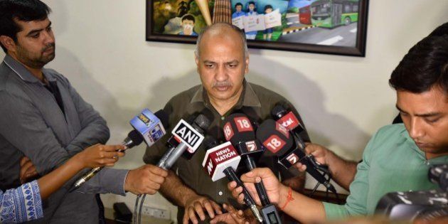 NEW DELHI, INDIA - JUNE 25: Delhi Deputy CM Manish Sisodia addressing the media after the Police arrested AAP legislator Dinesh Mohaniya for allegedly misbehaving with a woman and slapping a 60-year-old man, at his residence on June 25, 2016 in New Delhi, India. Mohaniya was arrested on charges of 'sexual harassment' on the complaint of a woman who visited his office-cum residence two days ago as part of a group to complain about irregular water supply, and slapping a 60-year-old man at Tughlakabad. Mohaniya, an MLA from Sangam Vihar constituency in south Delhi, was picked up by a team of Delhi Police while he was addressing a press conference at his residence in Sangam Vihar. (Photo by Ravi Choudhary/Hindustan Times via Getty Images)