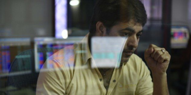 MUMBAI, INDIA - JUNE 25: A broker looks at his computer screen displaying the Sensex after Britain's exit from the European Union (EU), on June 25, 2016 in Mumbai, India. Britain voted to break away from the European Union on Friday, shattering the unity of a 60-year-old continental bloc, prompting the exit of Prime Minister David Cameron and rattling the world of finance and business. In India, shares fell more than 4% on the news but recovered by half after authorities moved to calm investor worries. The benchmark BSE ended 2.2% down, its biggest single-day percentage fall since February. (Photo by Arijit Sen/Hindustan Times via Getty Images)