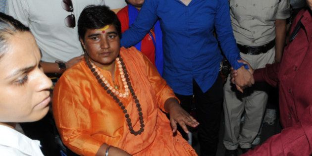 BHOPAL, INDIA - MAY 18: Hindu activist Sadhvi Pragya Singh Thakur leaving for Simhastha in Ujjain under heavy police protection on May 18, 2016 in Bhopal, India. Pragya Singh Thakur, who got a clean chit from the NIA in the 2008 Malegaon blasts case, went on an indefinite hunger strike on Monday to press for her demand that she be allowed to take a dip in Kshipra in Ujjain during the ongoing Simhastha. (Photo by Praveen Bajpai/Hindustan Times via Getty Images)