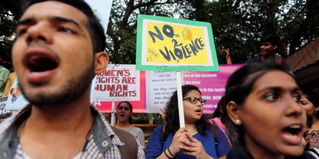 Demonstrators shout slogans during a protest against the rape and murder of a law student in the southern state of Kerala, in Mumbai, India, May 11, 2016. Authorities had released a sketch of a suspect and said they were looking for a man seen leaving the home of the 30-year-old law student. The case has evoked comparisons in the media with the gang rape and torture of a 23-year-old woman in New Delhi in 2012, which sparked nationwide protests. India toughened its anti-rape laws in response to the outcry following the 2012 murder, but rape, acid attacks, domestic violence and molestation are common. REUTERS/Shailesh Andrade