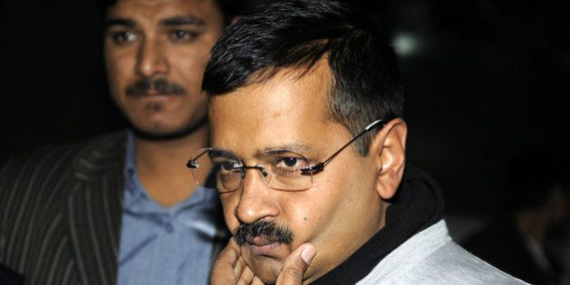 NEW DELHI, INDIA - DECEMBER 15: Delhi Chief Minister Arvind Kejriwal talking with media person outside the residence of Deputy Chief Minister Manish Sisodia on CBI raid on office of his Principal Secretary on December 15, 2015 in New Delhi, India. Enraged over this issue, Kejriwal claimed that his office was raided by CBI team allegedly on the orders of Prime Minister Narendra Modi. The central government rejected saying that it has no role to play in the raid. CBI investigators searched the office of Rajendra Kumar, Principal Secretary to the Delhi government, situated near Kejriwal's office in connection with corruption case. (Photo by Sonu Mehta/Hindustan Times via Getty Images)
