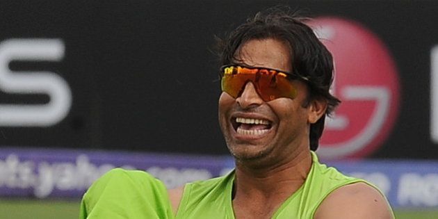 Pakistan cricketer Shoaib Akhtar laughs during a training session at The Suriyawewa Mahinda Rajapakse International Cricket Stadium in the southern district of Hambantota on February 21,2011. Pakistan are set to face Kenya in a match of the World Cup tournament on February 23, 2011. AFP PHOTO/ Lakruwan WANNIARACHCHI (Photo credit should read LAKRUWAN WANNIARACHCHI/AFP/Getty Images)
