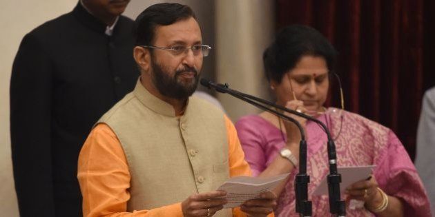 Bharatiya Janata Party (BJP) politician, Prakash Javadekar takes the oath during the swearing-in ceremony of new ministers following Prime Minister Narendra Modi's cabinet re-shuffle, at the Presidential Palace in New Delhi on July 5, 2016.Indian Prime Minister Narendra Modi revamped his cabinet bringing in 19 new junior ministers to speed up decision-making and delivery on promises made in this year's budget. / AFP / Prakash SINGH (Photo credit should read PRAKASH SINGH/AFP/Getty Images)