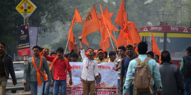 Indian Hindu activists from the Shiv Sena group march as they demand the construction of a Hindu temple in Ayodhya, on the anniversary of the destruction of a 16th century Muslim mosque at Ayodhya, in Allahabad on December 6, 2015. In 1992 tens of thousands of Hindu fundmentalists destroyed the historic Babri Masjid, in Ayodhya in Uttar Pradesh state, because it was thought to be birth place of the Hindu deity Ram. AFP PHOTO/SANJAY KANOJIA / AFP / Sanjay Kanojia (Photo credit should read SANJAY KANOJIA/AFP/Getty Images)