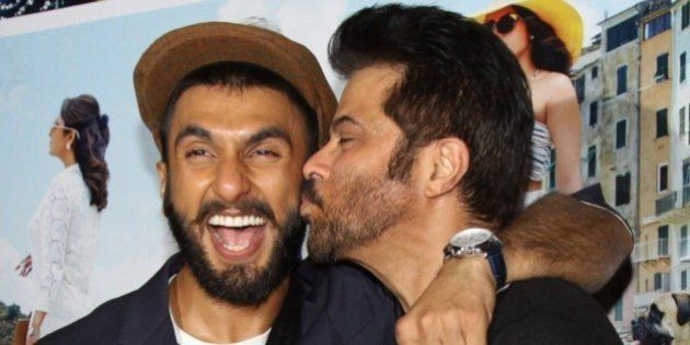 Indian Bollywood actors Anil Kapoor (R) and Ranveer Singh pose during the trailer showing of upcoming Hindi comedy-drama film 'Dil Dhadakne Do' directed by Zoya Akhtar and produced by Farhan Akhtar and Ritesh Sidhwani in Mumbai on April 15, 2015. AFP PHOTO (Photo credit should read STR/AFP/Getty Images)