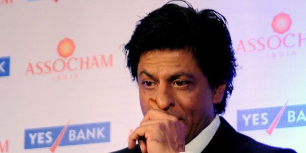 Indian Bollywood actor Shah Rukh Khan attends the launch of an ASSOCHAM (Associated Chambers of Commerce and Industry of India) coffee table book in Mumbai on November 23, 2015. AFP PHOTO / AFP / STR (Photo credit should read STR/AFP/Getty Images)