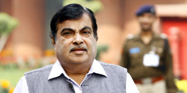 NEW DELHI, INDIA - NOVEMBER 26: Union Minister Nitin Gadkari arrives for the winter session of Parliament on November 26, 2015 in New Delhi, India. Opposition parties raised in Lok Sabha the issue of 'intolerance', saying the untoward incidents witnessed in the recent past should be condemned as they send out negative messages and asked Prime Minister Narendra Modi to address the matter. (Photo by Ajay Aggarwal/Hindustan Times via Getty Images)