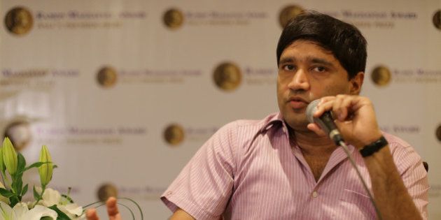 Ramon Magsaysay awardee Indian Sanjiv Chaturvedi, an anti-corruption campaigner, gestures as he answers questions from reporters at the Ramon Magsaysay Center in Manila, Philippines on Thursday, Aug. 27, 2015. Chaturvedi and a fellow countryman who recycle clothes for the poor are among this year's recipients of the Philippines' Ramon Magsaysay Award, often regarded as Asia's equivalent of the Nobel Prize. (AP Photo/Aaron Favila)