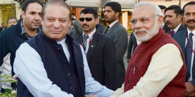 LAHORE, PAKISTAN - DECEMBER 25: Prime Minister of Pakistan Nawaz Sharif (L) shakes hands with Indian Prime Minister Narendra Modi (R) in Lahore, Pakistan on December 25, 2015. (Photo by Pakistan Information Department/Anadolu Agency/Getty Images)