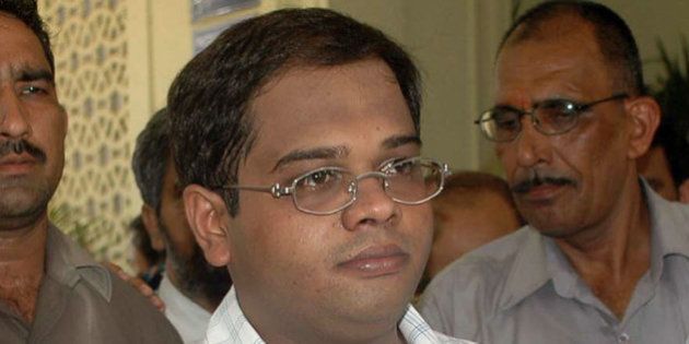 Amit Jogi, son of former Chhattisgarh Chief Minister Ajit Jogi, is produced in court in New Delhi, India, Saturday, July 2, 2005. Amit Jogi has been arrested in connection to the murder of Nationalist Congress Party leader Ramavtar Jaggi. (AP Photo)