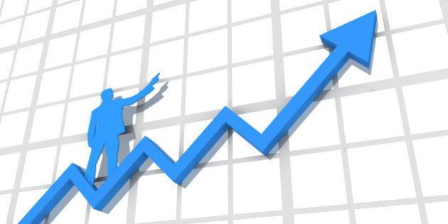 A 3d rendered blue arrow trending upwards on a blank line chart with a silhouetted blue businessman standing and pointing on it.