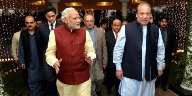 LAHORE, PAKISTAN - DECEMBER 25: Prime Minister of Pakistan Nawaz Sharif (R) welcomes Indian Prime Minister Narendra Modi (L) at Allama Iqbal International Airport in Lahore, Pakistan on December 25, 2015. (Photo by Indian Press Information office/Anadolu Agency/Getty Images)