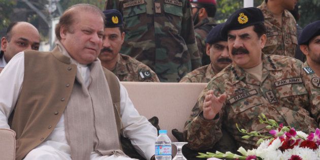 LAHORE, PUNJAB, PAKISTAN - 2015/01/31: Prime Minister of Pakistan Mian Muhammad Nawaz Sharif (Left) and Chief of Army staff General Raheel Sharif (Right) attended the passing out parade first batch of 421 Corporals, including 16 women, have successfully completed their training Counter Terrorism Force(CTF) at Elite Police Training School in Lahore. The new force -the first of its kind- has been given special training on how to counter terrorism by Pakistans Army. The first batch of the Punjab Elite Police Force (PEPF) completed their nine month long training course in the fields of investigation, intelligence and special operations. (Photo by Rana Sajid Hussain/Pacific Press/LightRocket via Getty Images)