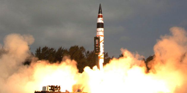 This photograph released by the Indian Ministry of Defense shows Indiaâs Agni-V missile, with a range of 5,000 kilometers (3,100 miles), being launched from Wheeler Island off India's east coast, Thursday, April 19, 2012. India announced the successful test launch Thursday of the new nuclear-capable missile that would give it the capability of striking the major Chinese cities of Beijing and Shanghai for the first time. (AP Photo/Indian Ministry of Defense)