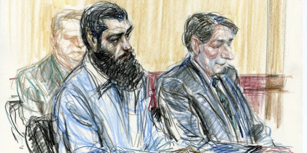 In this courtroom drawing Abid Naseer, front left, sits next to his court-appointed legal adviser James Neuman, right, as they listen to the guilty verdict against Naseer in federal court Wednesday, March 4, 2015, in the Brooklyn borough of New York. The jury found Naseer, who acted as his own lawyer, guilty in a failed al-Qaida bomb plot after a trial that featured spies in disguise, evidence from the raid on Osama bin Laden's compound and the defendant's questioning of an admitted co-conspirator. (AP Photo/Victor Juhasz)