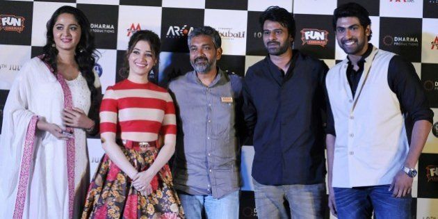 Indian Bollywood actors (L-R) Anushka Shetty, Tamannaah Bhatia, writter and director S. S. Rajamouli, and actors Prabhas and Rana Daggubati attend the trailer launch of their upcoming film 'Baahubali', written and directed by S. S. Rajamouli (L), in Mumbai late on June 1, 2015. AFP PHOTO (Photo credit should read STR/AFP/Getty Images)