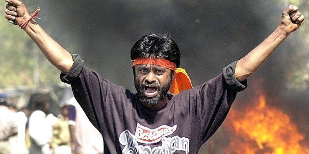 This famous photo from 2002 shows a Bajrang Dal activist who, years later, called the Gujarat riots a
