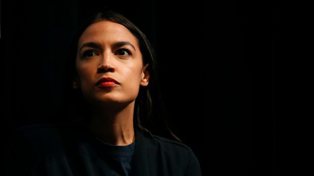 New York congressional candidate Alexandria Ocasio-Cortez listens to a speaker at a fundraiser Thursday, Aug. 2, 2018, in Los Angeles. The 28-year-old startled the party when she defeated 10-term U.S. Rep. Joe Crowley in a New York City Democratic primary. Ocasio-Cortez is a rising liberal star who is challenging the Democratic Party establishment. (AP Photo/Jae C. Hong)