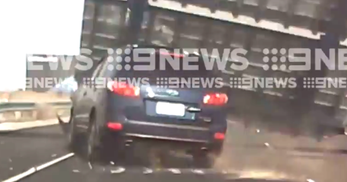 Driver Lucky To Be Alive After Falling Freeway Sign Crushes Car ...