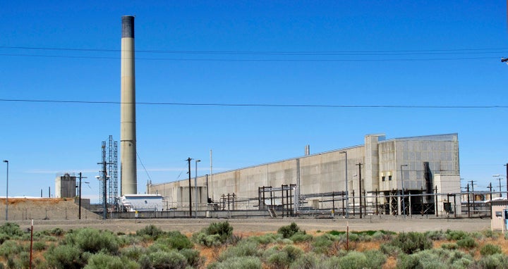 This May 13, 2017 file photo shows the Hanford Nuclear Reservation near Richland, Wash. The state of Washington said Tuesday, Jan. 8, 2019 that it opposes a federal proposal to reclassify as less dangerous some radioactive waste stored in underground tanks at the site. State officials said Tuesday they fear the change will allow the federal government to walk away from its obligation to clean up millions of gallons of radioactive waste.