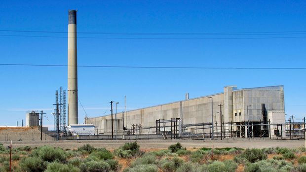 FILE - This May 13, 2017 file photo shows a portion of the Plutonium Finishing Plant on the Hanford Nuclear Reservation near Richland, Wash. The state of Washington said Tuesday, Jan. 8, 2019 that it opposes a federal proposal to reclassify as less dangerous some radioactive waste stored in underground tanks at the site. State officials said Tuesday they fear the change will allow the federal government to walk away from its obligation to clean up millions of gallons of radioactive waste. (AP Photo/Nicholas K. Geranios, File)