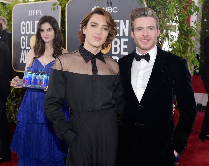 Kelleth in the background of Cody Fern and Richard Madden's photo