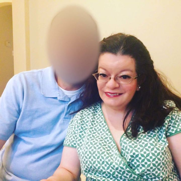 Amanda Auchter and her husband, who has been an FAA employee for 20 years. His face is blurred to protect his identity for fear of agency retribution or loss of his job.