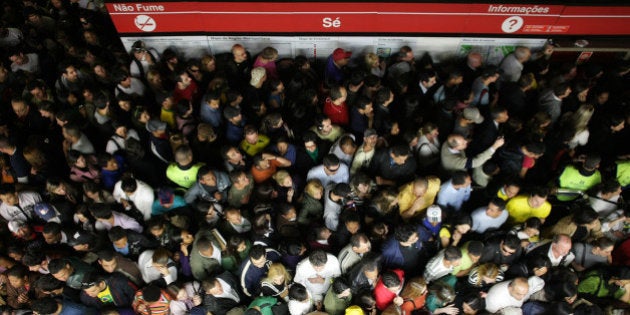 SAO PAULO, BRAZIL - JUNE 15: Brazilian supporters crowd the Se subway station as thousands hurry to watch...