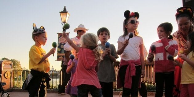Shaking and dancing to traditional Mexican music at Epcot.