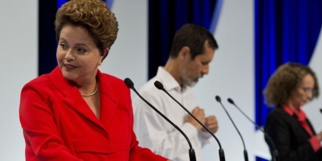 Presidential candidate for the Brazilian Workers' Party and current Brazilian President Dilma Rousseff (L) attends the second television debate in Sao Paulo, Brazil on September 1, 2014. Brazilian general elections will take place next October 5. AFP PHOTO / NELSON ALMEIDA (Photo credit should read NELSON ALMEIDA/AFP/Getty Images)