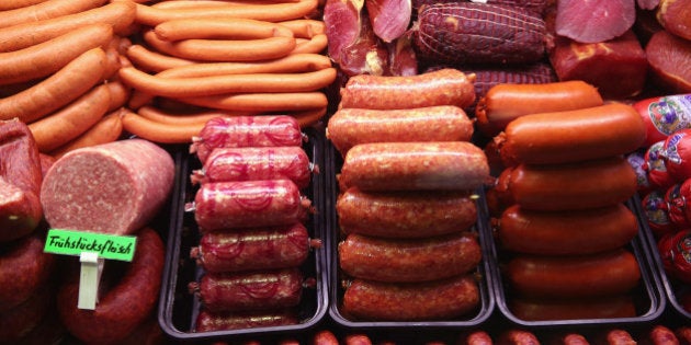 BERLIN, GERMANY - JANUARY 16: Sausages, wurst and dried meats await visitors at a stand at the International Green Week agricultural trade fair (Internationale Gruene Woche) on January 16, 2015 in Berlin, Germany. The International Green Week is the world's largest agricultural trade fair and is open to the public from January 16-25. (Photo by Sean Gallup/Getty Images)