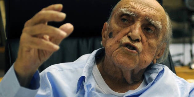 Brazilian architect Oscar Niemeyer speaks with AFP during an interview for his 102nd birthday, in his studio in Rio de Janeiro on December 15, 2009. Niemeyer, one of the most outstanding referents in modern architecture, is planning for next year to make improvements in the famously known Sambodromo, which he designed. AFP PHOTO/Vanderlei Almeida (Photo credit should read VANDERLEI ALMEIDA/AFP/Getty Images)