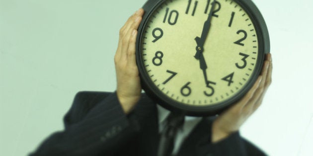 Businessman with clock