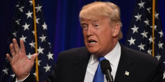 Republican presidential candidate Donald J. Trump speaks at the Saint Andelm College New Hampshire Institute of Politics in Manchester, New Hampshire June 13, 2016. / AFP / TIMOTHY A. CLARY (Photo credit should read TIMOTHY A. CLARY/AFP/Getty Images)