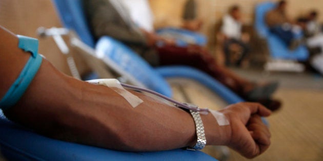 Yemenis donate blood for the victims of airstrikes by the Saudi-led coalition, at a tent in Sanaa, Yemen, Tuesday, Feb. 23, 2016. (AP Photo/Hani Mohammed)