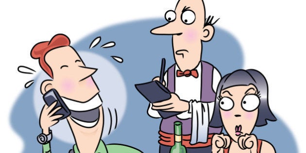 A woman upset at her date for talking on his cell phone while they are at a restaurant