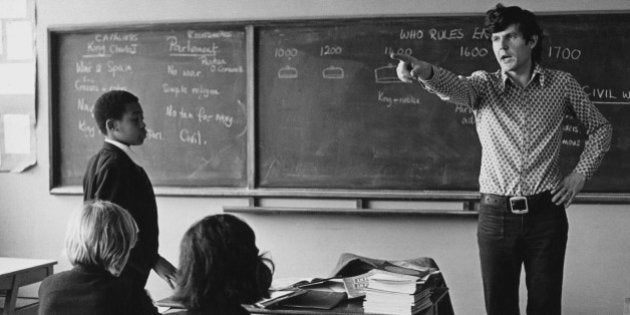 Secondary school teacher getting angry at disruptive children in the classroom. (Photo by: Photofusion/UIG via Getty Images)