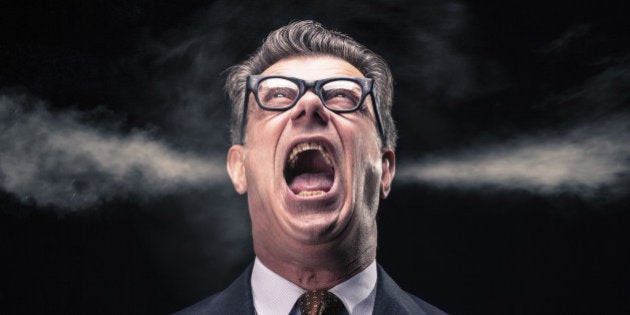A stressed and upset businessman with grunge glasses is shouting while two steam jets go out from his ears.