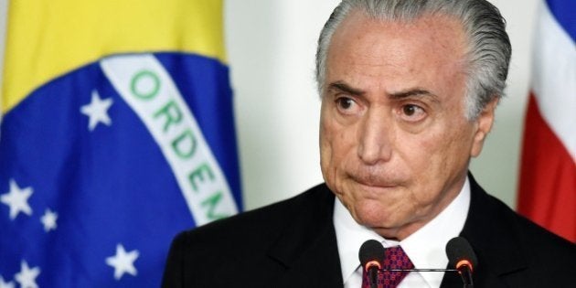 Brazilian Vice President Michel Temer speaks during a meeting with Prince Haakon of Norway at Planalto Palace in Brasilia, on November 16, 2015. AFP PHOTO/EVARISTO SA (Photo credit should read EVARISTO SA/AFP/Getty Images)