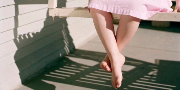 Girl Sitting on Porch