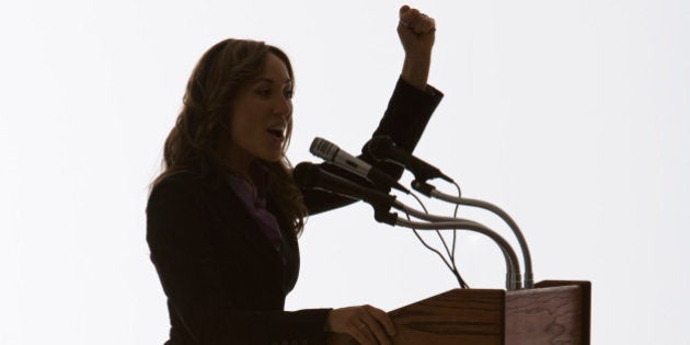 Woman speaking from podium
