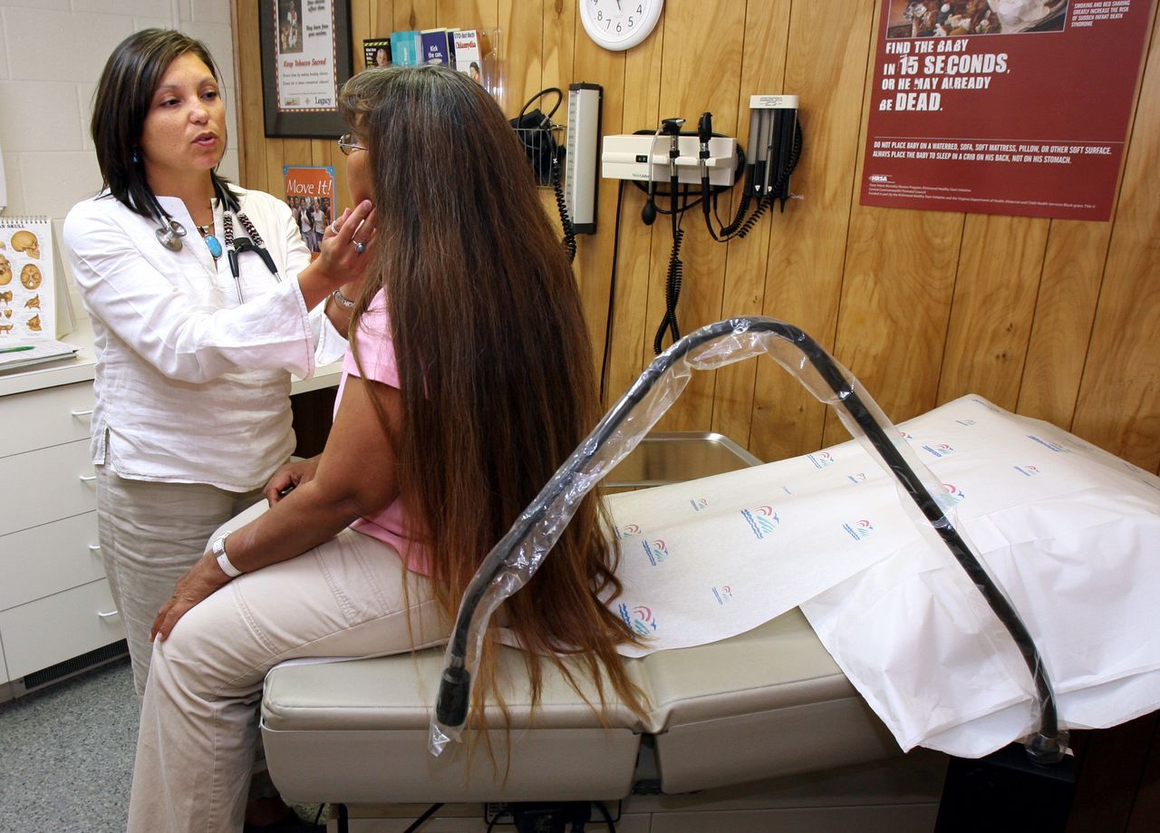 Dr. LeeAnna Muzquiz of Ronan Tribal Health examines Mary Parker during a checkup in Ronan, Montana.