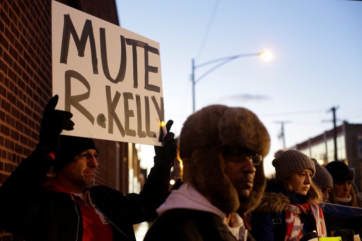 Demonstrators gather near a music studio to show support for survivors of sexual abuse following a television docuseries on R