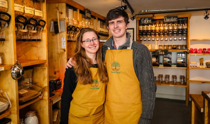 Chloe and Rob Masefield in their plastic-free grocery store, Natural Weigh, in the U.K.