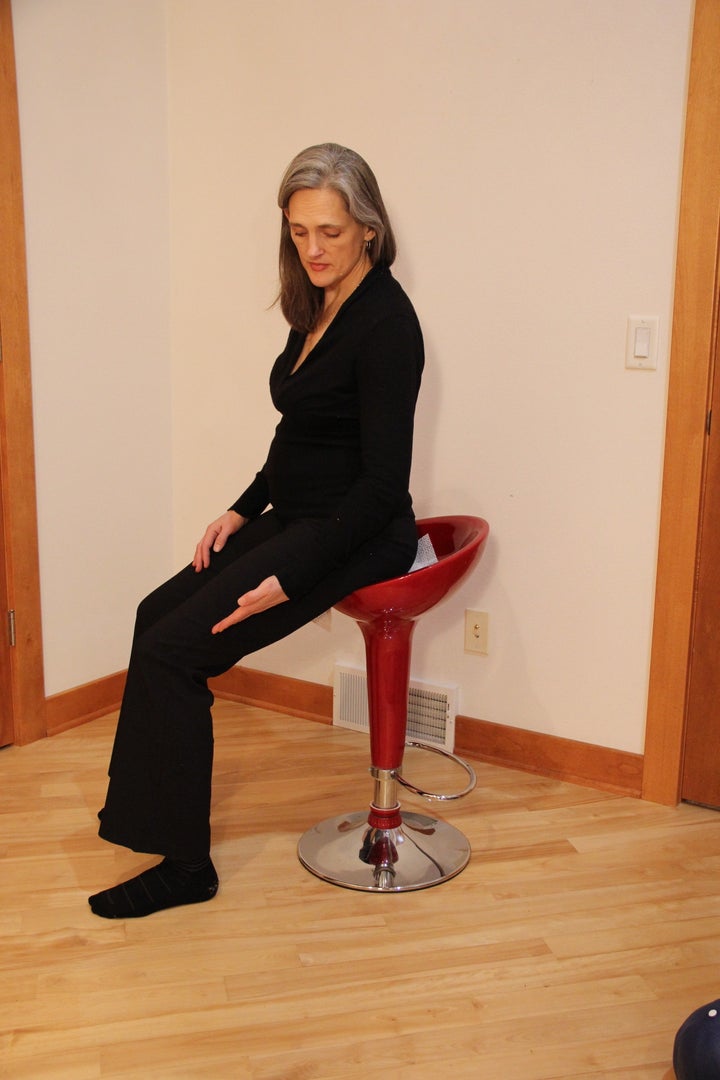 Hilary Bryan demonstrates saddle height on a stool.